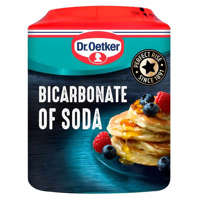 Dr.Oetker Bicarbonate Of Soda 200g, an essential baking raising agent, features a picture of pancakes with berries on its front label.