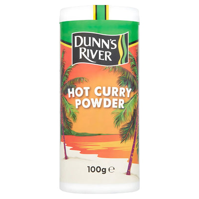 A 100g container of Dunn's River Hot Curry Powder, with a vibrant label displaying a beach scene and palm trees.