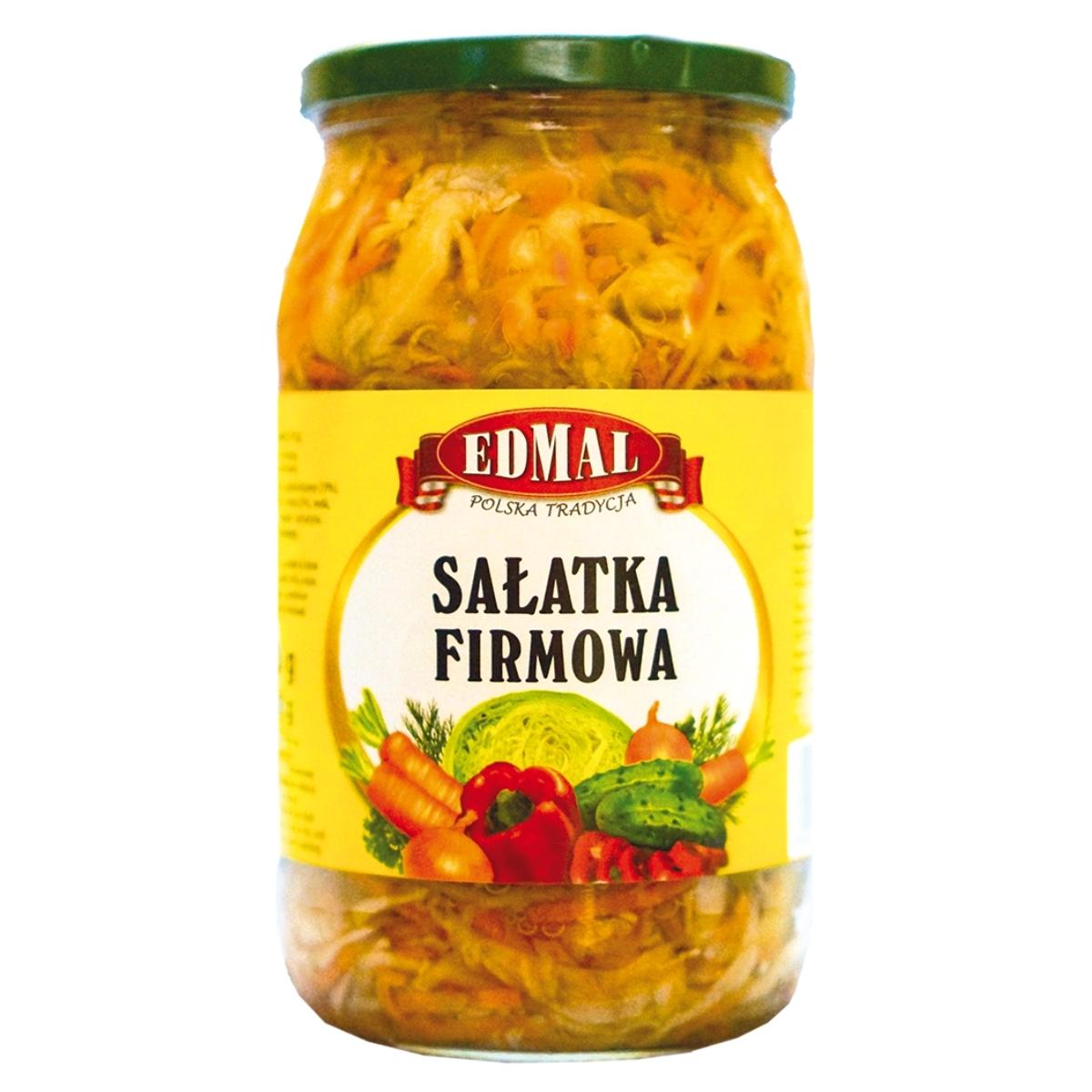 A jar of Edmal Vegetable Salad (Salatka Firmowa) - 820g with a yellow label featuring crisp vegetables, providing a flavorful salad experience.