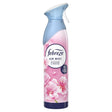 A 185ml can of Febreze - Blossom & Breeze Air Mist, an odour eliminator with a blue nozzle and pink floral graphics on the label.