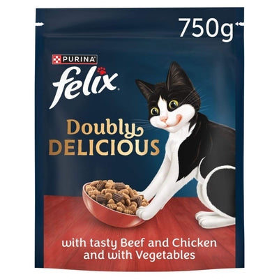 A 750g bag of Felix - Doubly Delicious Beef Chicken & Vegetables Dry Cat Food, featuring a black and white cat with a bowl.