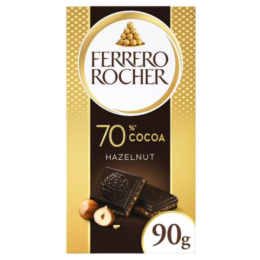 Front of Ferrero Rocher - Dark Chocolate Bar With Hazelnuts & Cocoa Filling - 90g packaging, showing rich dark chocolate with hazelnuts, chocolate pieces, and whole hazelnuts. Brand: Ferrero Rocher. Net weight: 90g.