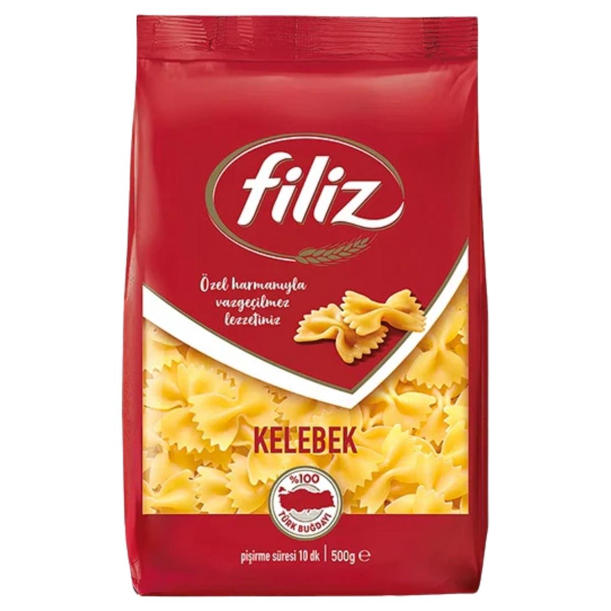 A 500g pack of Filiz - Kelebek Wheat Semolina Pasta, butterfly-shaped and perfect for pasta salads, comes in red packaging with images of the pasta and Turkish text.