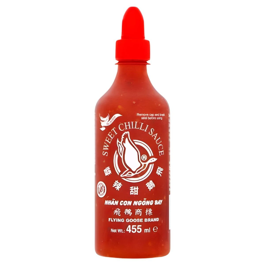 Flying Goose - Sweet Chilli Sauce - 455ml: Add authentic Thai flavour to your dishes with this classic sauce from Flying Goose. Comes in a 455ml bottle with a red cap, featuring the signature logo and white text on the label.