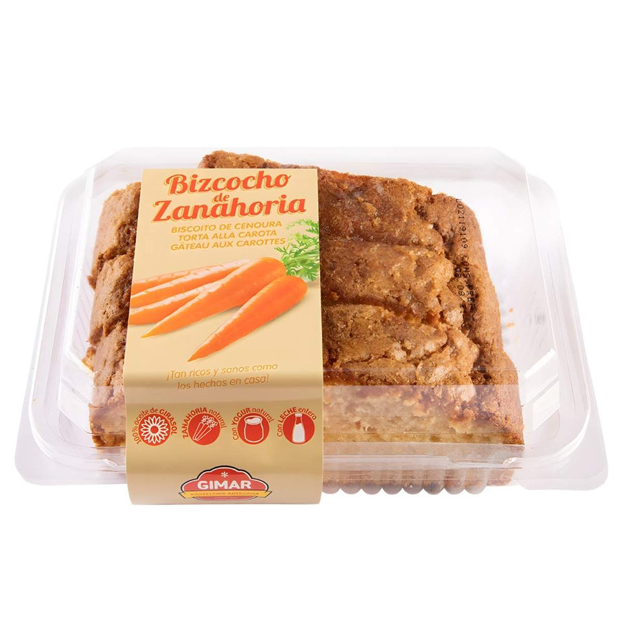 Gimar - Carrot Sponge Cake - 360g: A clear plastic container from Gimar with a label featuring “Bizcocho de Zanahoria” and carrot images. The carrot sponge cake is cut into rectangular slices for a premium bakery experience.