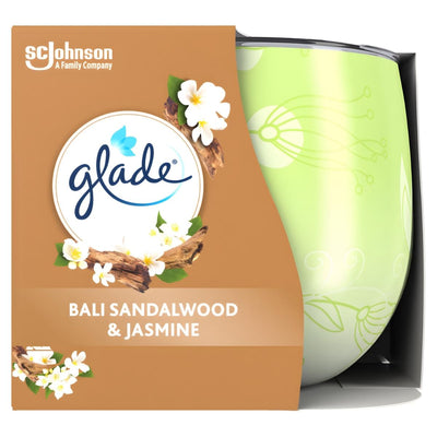 The Glade - Bali Sandalwood & Jasmine Scented Candle (120g) features a relaxing fragrance, housed in a green floral-patterned glass and brown box with white flowers, perfect for creating a calming atmosphere in your space.