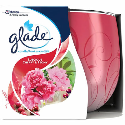 The Glade Candle Luscious Cherry & Peony 120g, in a pink glass holder with floral-themed packaging, fills your space with a long-lasting fragrance.