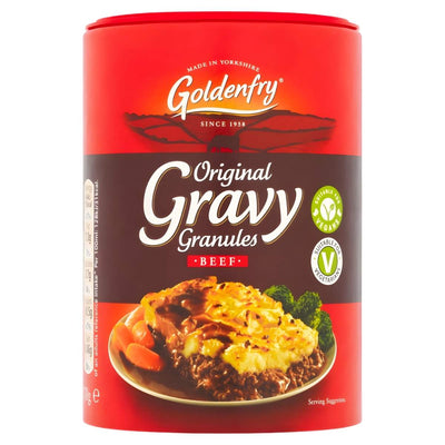 A red 170g container of Goldenfry Gravy Granules Beef, a kitchen staple for delicious beef gravy, features a meal topped with rich gravy on the front.