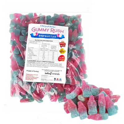 Gummy Rush - Baby Bottles (Halal) - 1Kg by Gummy Rush features pink, blue, and white baby bottle gummies in a clear bag with a front nutrition label—perfect for a fun and delicious halal treat.
