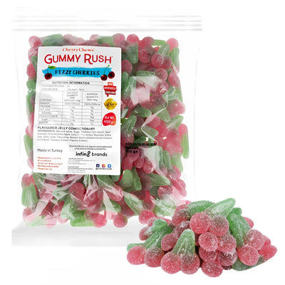 A clear bag labeled "Gummy Rush - Fizzy Cherries (Halal) - 1Kg" from Gummy Rush, filled with red and green sugar-coated halal cherry gummies, with some displayed in front.