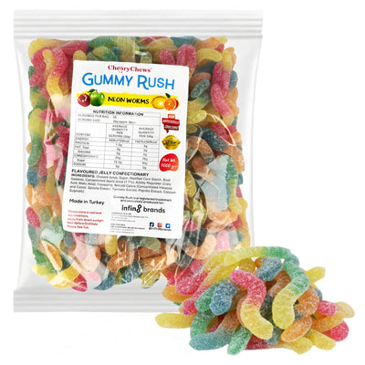 A clear bag labeled "Gummy Rush - Neon Worms (Halal) - 1Kg" features colorful, sugar-coated worm-shaped gummies by Gummy Rush, with some candies displayed in front of the pack.