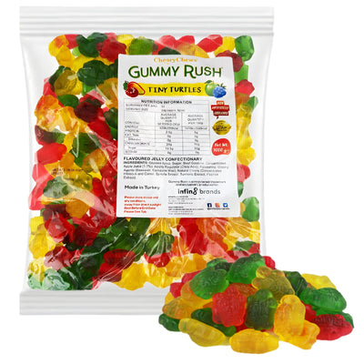 A clear 1kg pack labeled "Gummy Rush - Tiny Turtles (Halal)" by Gummy Rush contains colorful Halal gummy turtle candies, with a vibrant pile of gummies displayed in front of the bag.