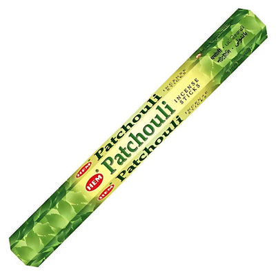 The HEM - Patchou Incense Stick pack displays a leaf design on its green hexagonal box, elegantly featuring bilingual text. Ideal for aromatherapy, these sticks create a calming sanctuary with their soothing fragrance.