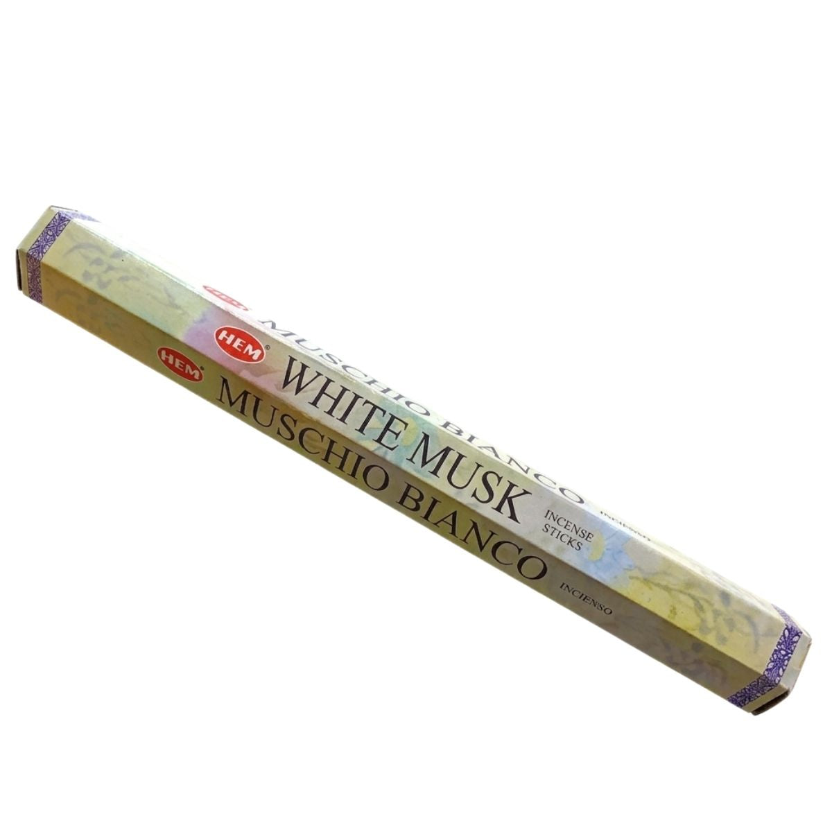 A box of HEM White Musk Incense Sticks (20 sticks), featuring light-colored packaging with purple accents.