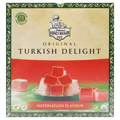 A 320g box of Haci Bekir - Original Watermelon Flavour Turkish Delight, with pink cubes pictured on the front and green and gold patterned edges.