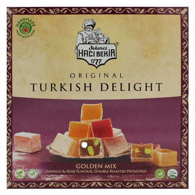 Treat yourself to the Haci Bekir - Golden Mix Turkish Delight, a luxurious 320g box featuring exquisite mango, rose, and double roasted pistachio flavors, elegantly presented in a purple and gold design.