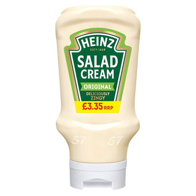 A 425g bottle of Heinz Original Salad Cream, the classic tangy British dressing, features a green label and white flip-top cap, stands upside down, and is priced at £3.35 RRP.