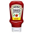 The Heinz Tomato Ketchup 460g plastic bottle features a £3.35 label and tomato illustration, showcasing the classic tangy flavour against a white background.