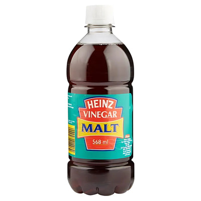 A 568ml bottle of Heinz Vinegar Malt, a classic barley malt vinegar condiment, featuring a teal and orange label with a white cap.