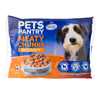 A 400g pack of HiLife - Pets Pantry Meaty Chunks in Gravy pet food contains 4 pouches, including 2 with chicken and 2 with turkey, enriched with vitamins and minerals, and features a dog's image on the packaging.