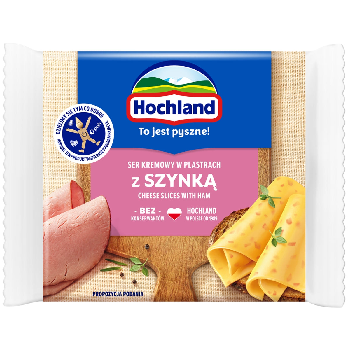 Hochland - Cheese Slices with Ham - 130g packaging displays processed cheese slices with ham and features product information in both Polish and English.
