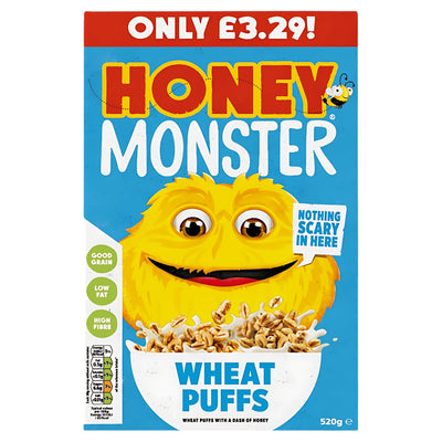 The front of the Honey Monster - Wheat Puffs - 520g cereal box features the yellow Honey Monster, product name, price, and health icons on a blue background, highlighting this fortified breakfast cereal.