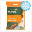 Orange and white package of Humza frozen chicken samosas in 650g, featuring a snowflake icon, offers 20 pieces of Indian snacks made from 100% halal chicken.