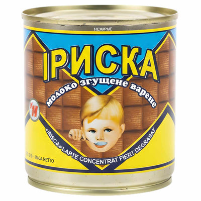 A 370g can of Iriska Boiled Condensed Milk features a child with a spoon on the label, Cyrillic text, and a yellow-blue design.