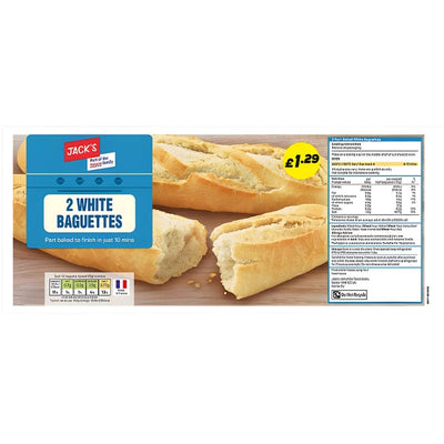 Jack's - Part Baked White Baguettes (2 pcs) packaging displays the part-baked loaves, price of £1.29, nutrition info, and preparation instructions on a light wooden surface.