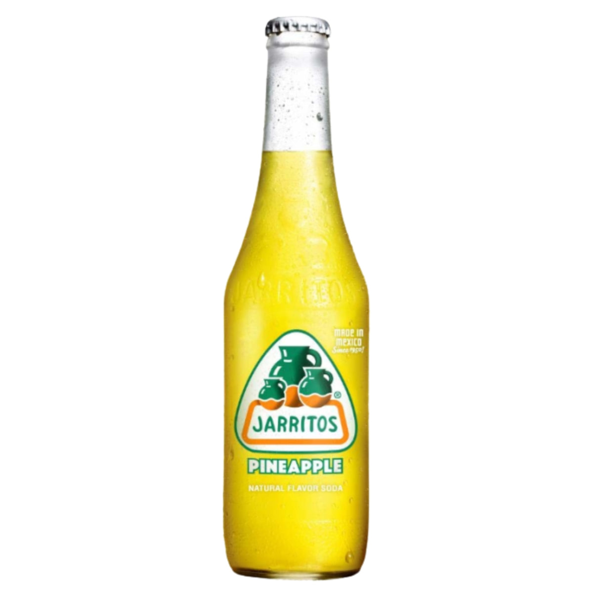 A glass bottle of Jarritos Pineapple soda, filled with bright yellow liquid and featuring the classic green and orange Jarritos logo on the front, set against a plain white background.