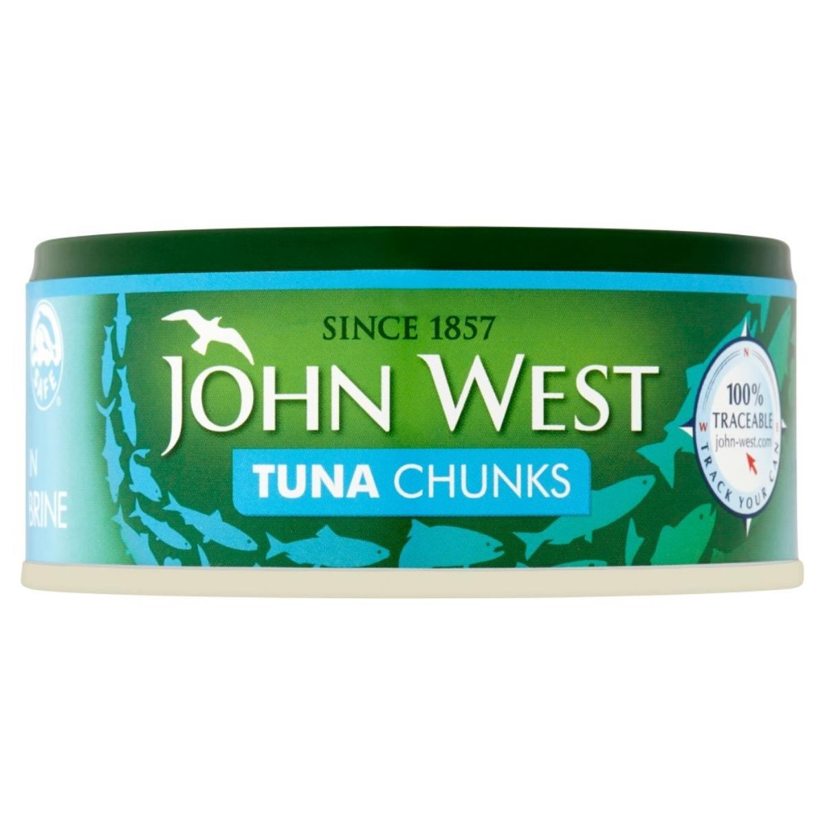 A 145g can of John West Tuna Chunks in Brine, featuring a green label with a blue fish design and a "100% Traceable" badge, offers convenience without compromising quality. Review the nutritional information for an ideal health-conscious choice.