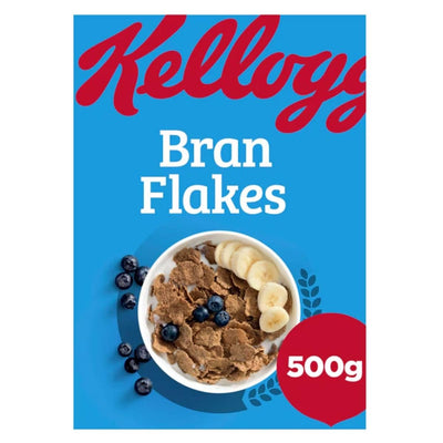 A 500g box of Kellogg's Bran Flakes—nutritious cereal shown with banana slices and blueberries on a blue background—makes the perfect breakfast to start your day.