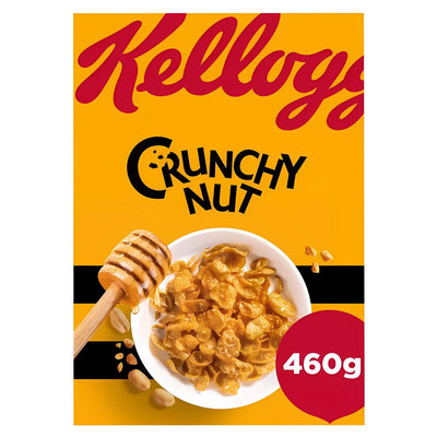 Front of a Kellogg's - Crunchy Nut Cereal - 460g box, featuring a bowl of cereal, honey dipper, scattered nuts, and highlighting natural grains and added Vitamin D.
