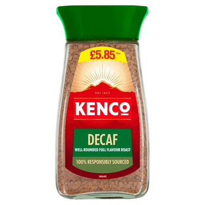 A 100g jar of Kenco Decaff Instant Coffee with a green lid, red label, £5.85 price sticker, and a label stating it's 100% responsibly sourced decaffeinated coffee.