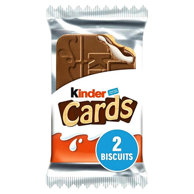 The Kinder - Cards 25.6g packaging features two delicious creamy wafer cookies coated in chocolate and wrapped in a foil packet, making them a delightful sweet treat.