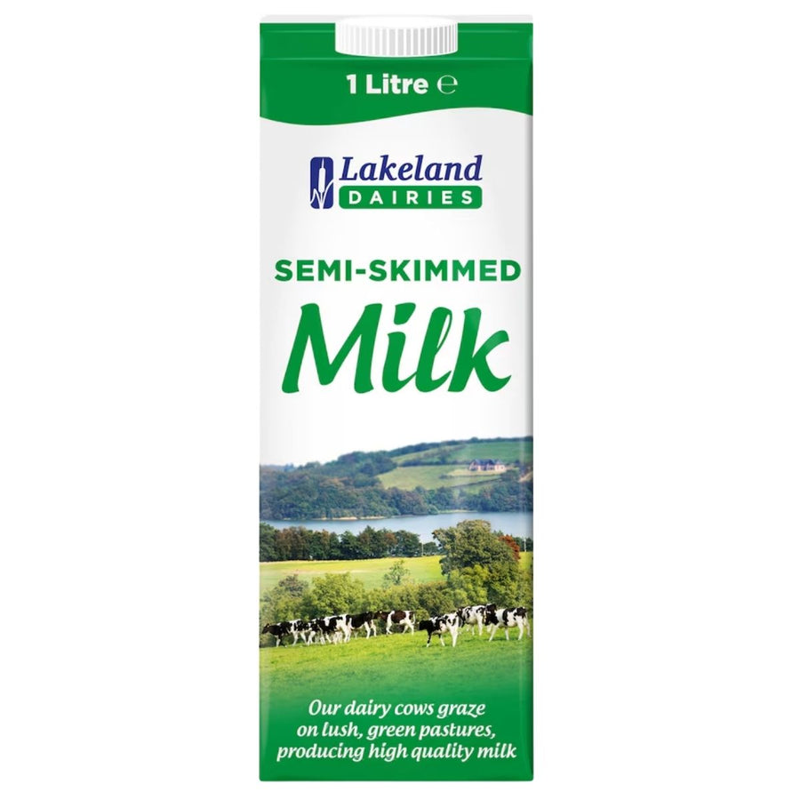 Lakeland Dairies Semi Skimmed Long Life UHT Milk 1L in a green and white carton features a pasture scene with cows and product info. Source of calcium.