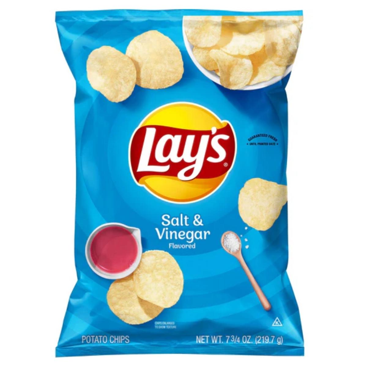 A bag of Lays - Salt & Vinegar - 150g potato chips featuring imagery of chips, a vinegar dish, and a salt spoon on its blue packaging.