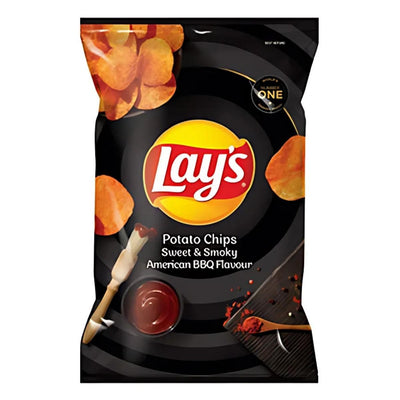 Lays Sweet & Smoky American BBQ Crisps 105g offer bold flavor and premium ingredients, featuring chips with BBQ sauce and grill marks on a black background for a standout snacking experience.