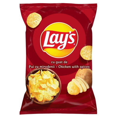 A red 125g bag of Lays - Chicken With Spices Crisps displays images of chips, potatoes, and a bowl, labeled "cu gust de Pui cu mirodenii • Chicken with spices," emphasizing its savory chicken flavor.