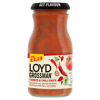 A glass jar of Loyd Grossman Tomato & Chilli Sauce on a plain white background. The jar contains a reddish-orange sauce and has a black lid with the words 'GET FLAVOUR' in white.