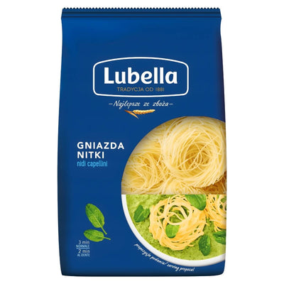 A 400g blue pack of Lubella Thread (Gniazda Nitki) Pasta Nests, made from durum wheat, shows uncooked nest-shaped noodles through a window and features a serving suggestion with sauce and basil.