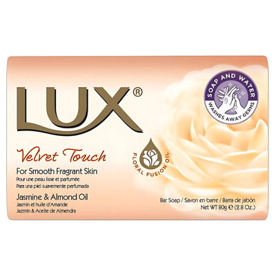 Front view of the Lux - Velvet Touch Soap - 80g package, featuring jasmine and almond oil, with a rose design and text highlighting its gentle cleansing for soft, smooth skin.