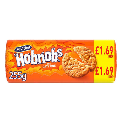 A 255g pack of McVities - Hobnobs Biscuits The Oaty One, in a bright orange wrapper, is labeled with a £1.69 RRP.
