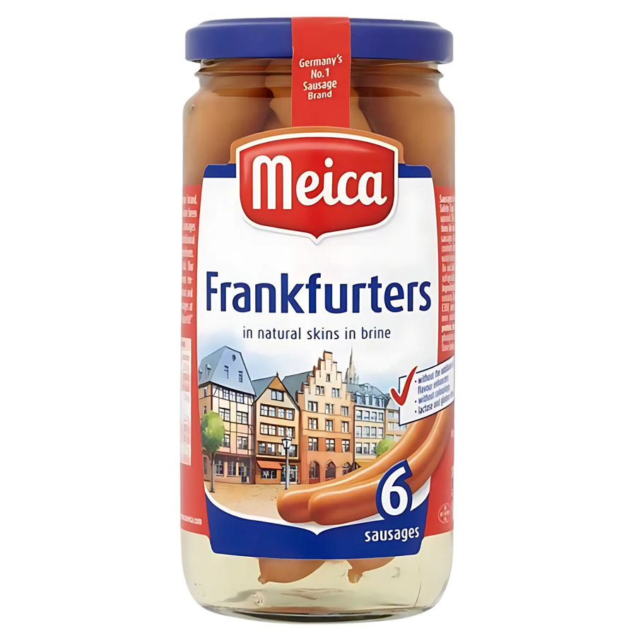 A 150g glass jar of Meica Frankfurters in natural skins in brine by meica features a blue lid and a label with an illustrated town scene.
