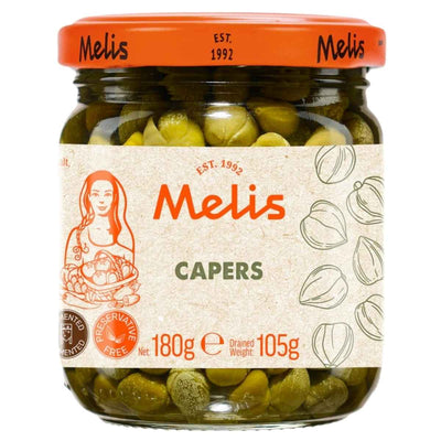 A 180g glass jar of Melis Capers with an orange lid features the Melis brand label, capers illustration, and offers a Mediterranean flavour ideal for versatile culinary use.