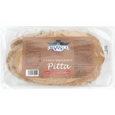 A clear plastic pack of six Michael's Large Wholemeal Pitta Breads from Michaels Pitta Bakery, baked with wholemeal flour for a delicious, high-fibre option. The label reads "Michael's - Large Wholemeal Pitta Bread - 6 Pack.