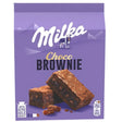 Front of a Milka - 6 Choco Brownie Slices - 150g box featuring two rich chocolate brownies, caramel pieces, and the Milka logo with an alpine landscape—a tasty chocolate treat for any occasion.