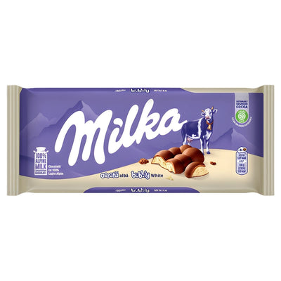 The Milka Bubbly White Chocolate Bar (95g) features signature purple and cream packaging, a cow illustration, and an image of the aerated white chocolate bar.