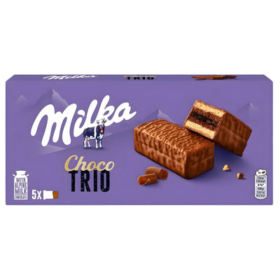 A box of Milka - Choco Trio Alpine Milk Chocolate Cakes 5 Pack (5 x 30g), featuring the brand’s signature chocolate-covered, layered bars on a purple background. Contains 5 delicious cakes.