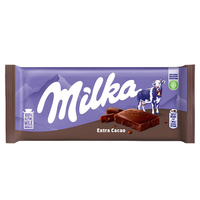 Milka - Chocolate Bar With Extra Cocoa (90g) comes in signature purple packaging, showing a cow, mountains, and chocolate pieces on the front to emphasize its rich cocoa content and classic Alpine milk chocolate taste.